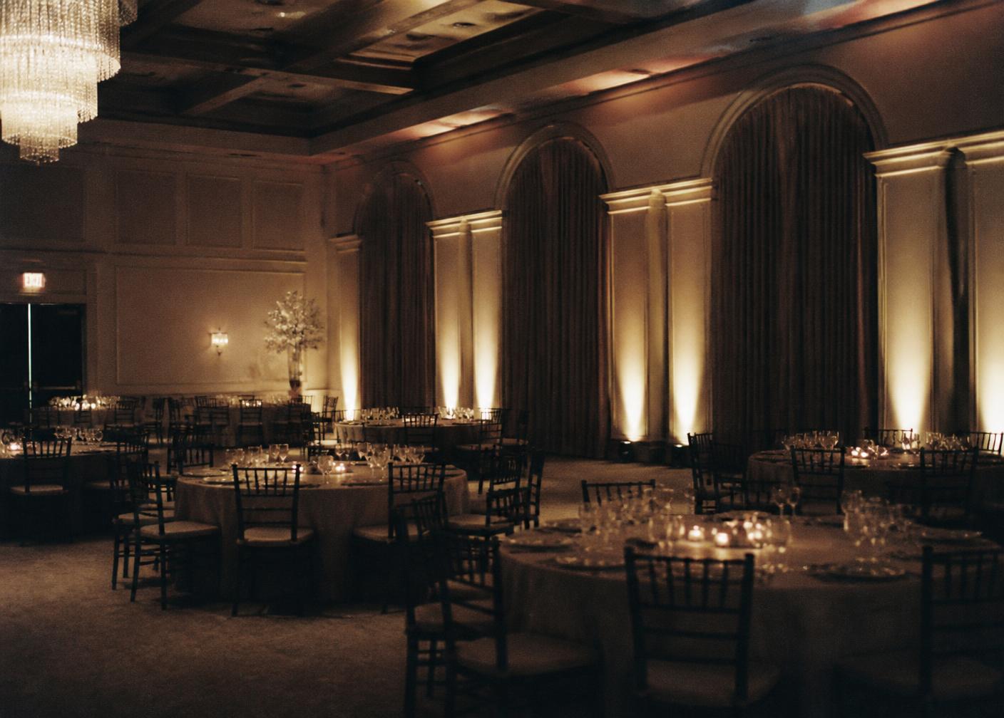 Warmly uplit private event ballroom